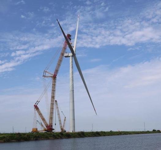 單機年發電量1億度！全球最大海上風電機組完成吊裝